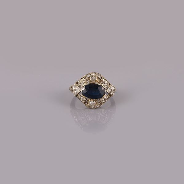 18KT GOLD, SAPPHIRE AND DIAMONDS RING