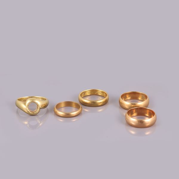 18KT GOLD LOT OF FIVE RINGS