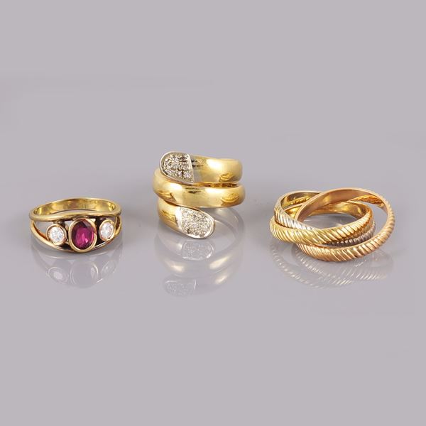 18KT GOLD LOT OF THREE RINGS WITH RUBY AND DIAMONDS