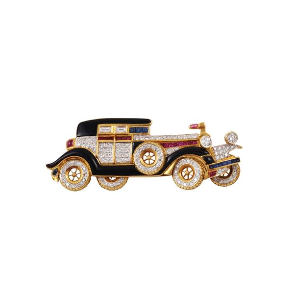 18KT GOLD, DIAMONDS, RUBIES, SAPPHIRES AND ONYX CAR-SHAPED BROOCH