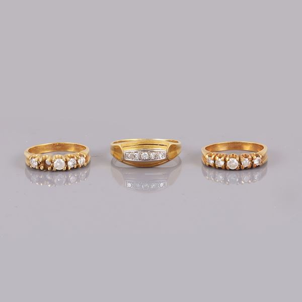 LOT OF THREE RINGS. 18KT GOLD AND DIAMONDS 