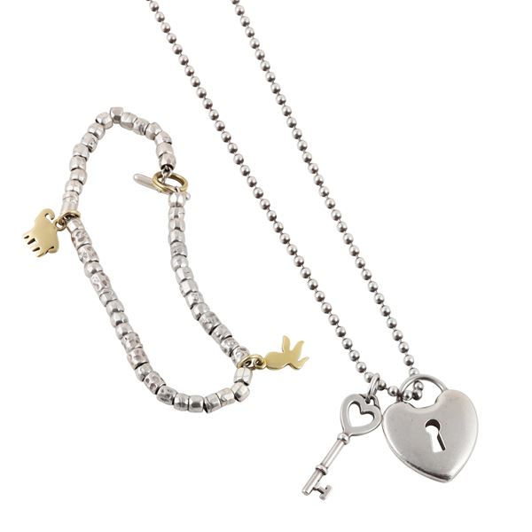 TIFFANY & Co., 925 SILVER NECKLACE WITH PENDANTS. 925 SILVER AND 18KT GOLD BRACELET WITH DODO PENDANTS