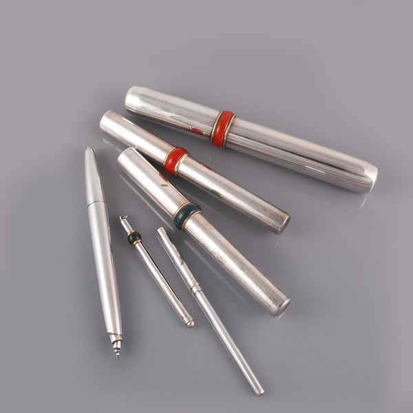 A CIGAR HOLDER, A CHAMPAGNE WHISK, THREE PENS (NOT WORKING) AND A MECHANICAL PENCIL. 925 SILVER AND BACKELITE, POMELLATO
