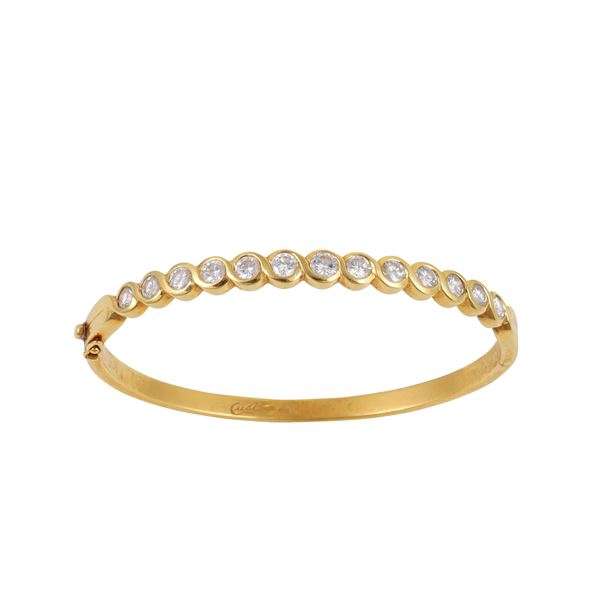 18KT GOLD AND DIAMONDS BANGLE, CUSI