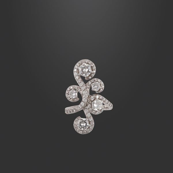 18KT GOLD AND DIAMONDS RING, CUSI