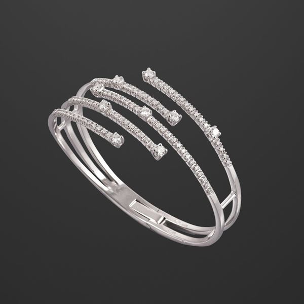 18KT GOLD AND DIAMONDS BANGLE, BY DAMIANI "Notte di San Lorenzo"