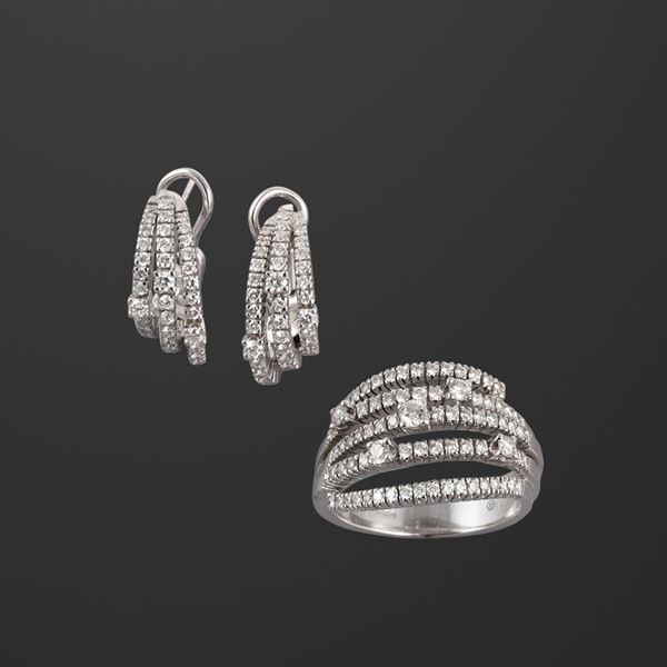 18KT GOLD LOT OF RING AND EARRINGS WITH DIAMONDS, BY DAMIANI "Notte di San Lorenzo"