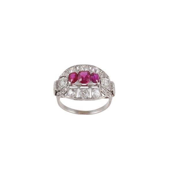 PLATINUM, RUBIES AND DIAMONDS RING