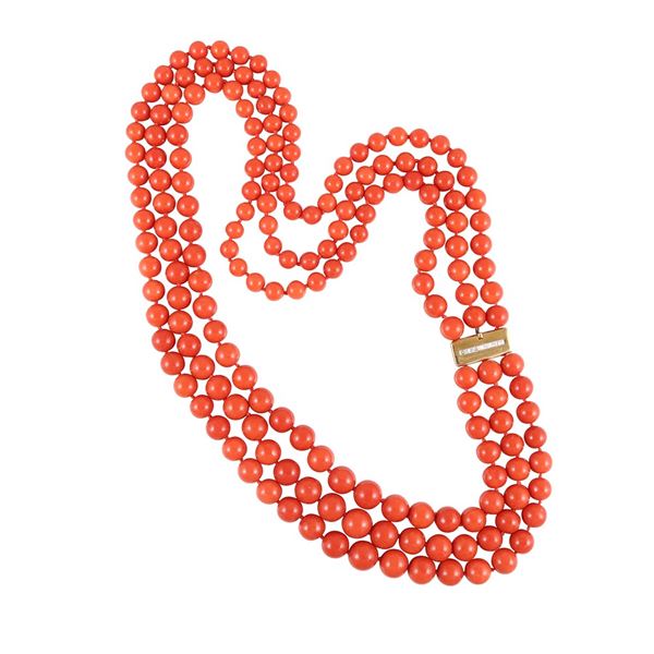 ~ THREE STRANDS OF CORAL WITH 18KT GOLD AND DIAMOND CLASP
