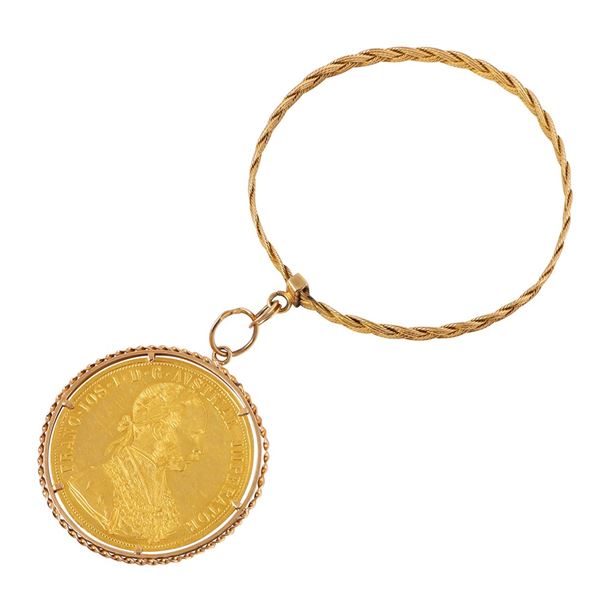 18KT BANGLE WITH GOLD COIN 
