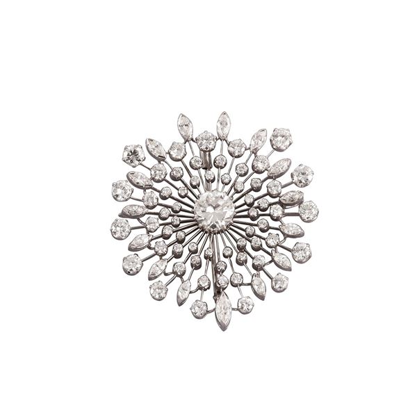 2,17 CT BRILLIANT CUT DIAMOND, SETTING ON 18KT GOLD AND DIAMONDS BROOCH