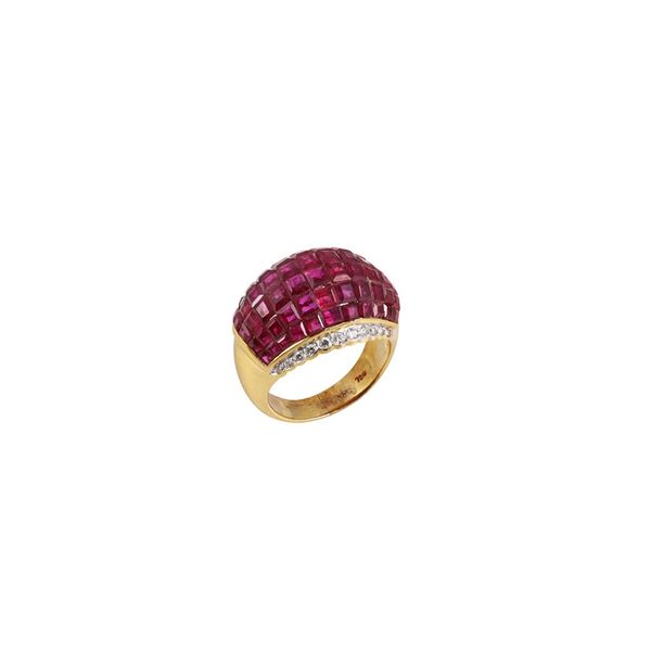18 KT GOLD, "Serti invisible" RUBIES AND DIAMONDS RING