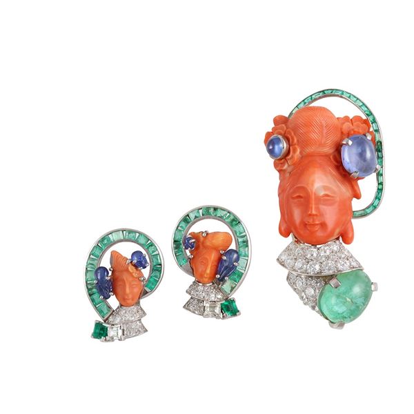 18KT GOLD AND PLATINUM EARRINGS WITH CORAL, EMERALDS AND ENGRAVED SAPPHIRES, BY SEAMAN SCHEPPS. 18KT GOLD BROOCH WITH CORAL, EMERALDS (one missing), SAPPHIRES AND DIAMONDS.