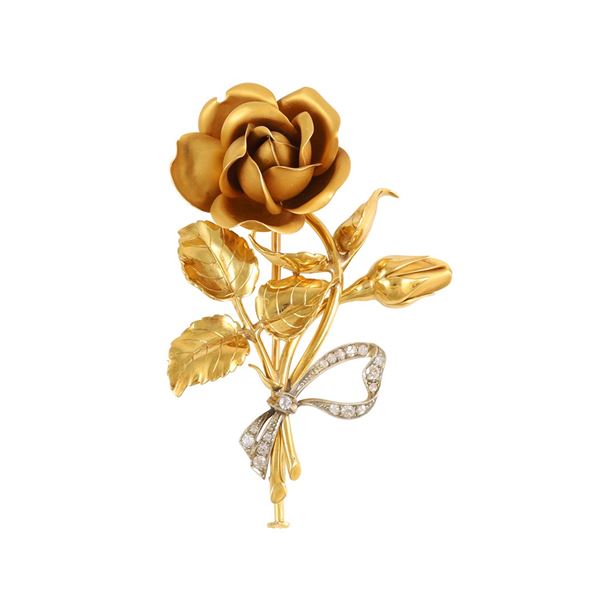 18KT GOLD AND DIAMONDS BROOCH