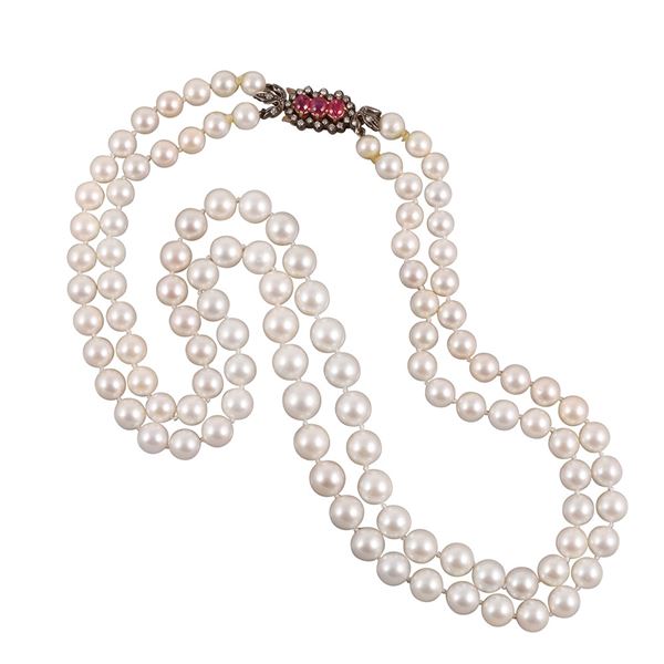 CULTURED PEARLS NECKLACE, WITH 18KT GOLD, SILVER, DIAMOND AND RUBY CLASP