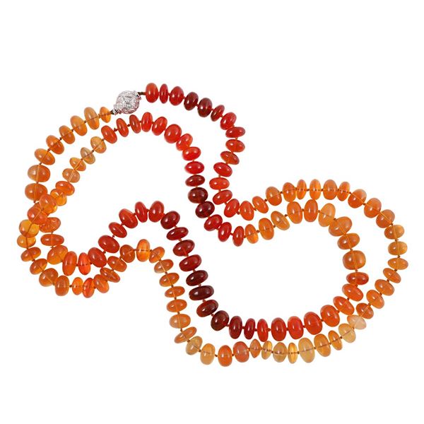 A SINGLE STRAND OF FIRE OPALS WITH 18KT GOLD AND DIAMONDS CLASP