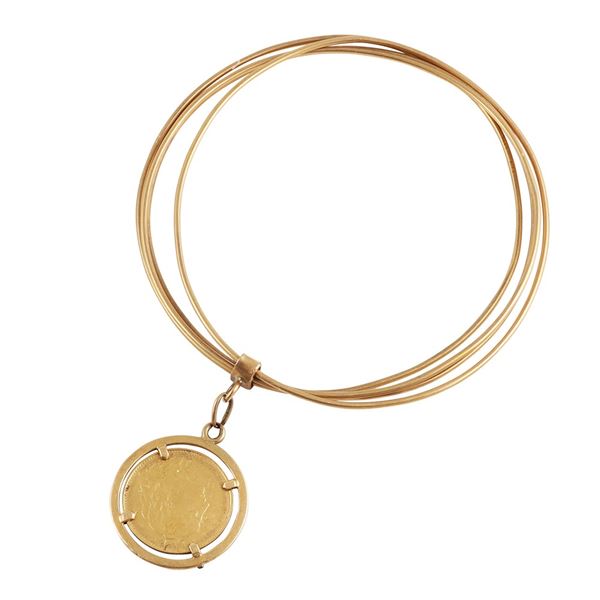 18KT GOLD BANGLE WITH GOLD COIN