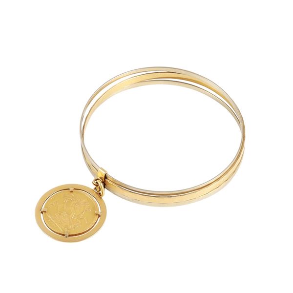 18KT GOLD BANGLE WITH GOLD COIN
