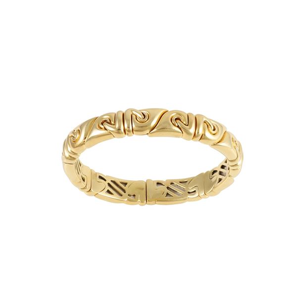18KT GOLD BANGLE, BY BULGARI "Saetta"