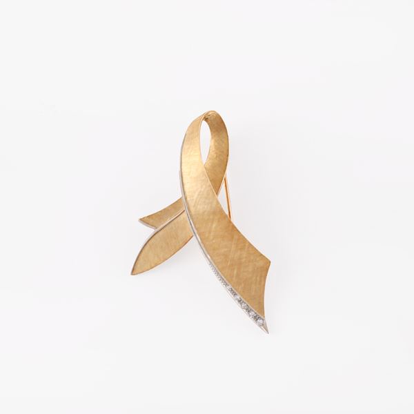 18KT GOLD AND DIAMONDS BROOCH