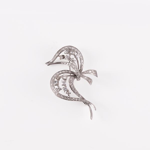 18KT GOLD AND DIAMONDS BROOCH