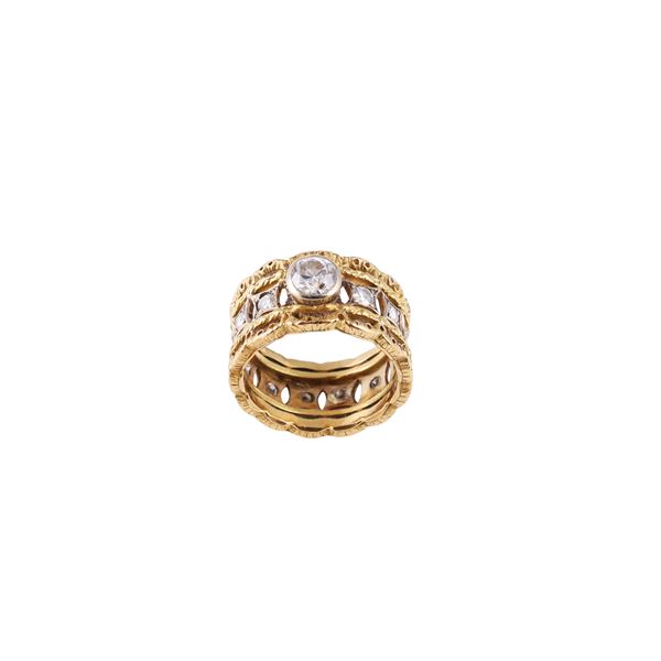 18KT GOLD AND DIAMONDS (one missing) RING