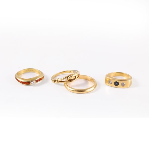 LOT OF FOUR 18KT GOLD RINGS WITH DIAMONDS, SAPPHIRE AND ENAMEL (missing)