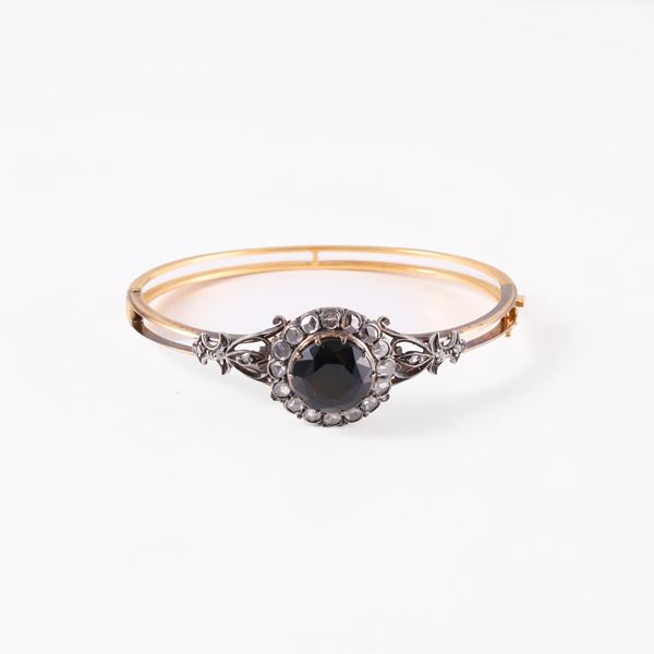 18KT GOLD, SILVER, GREEN CORUNDUM AND ROSE CUT DIAMOND BRACELET WITH A HIDDEN COMPARTMENT