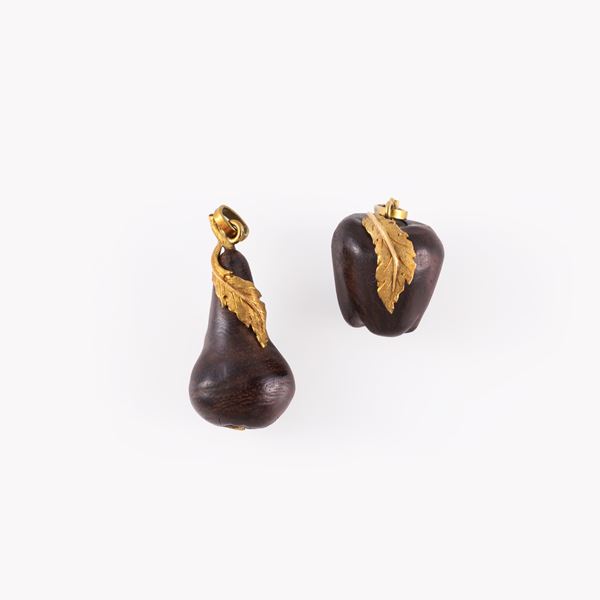 LOT OF TWO 18KT GOLD AND WOOD PENDANTS