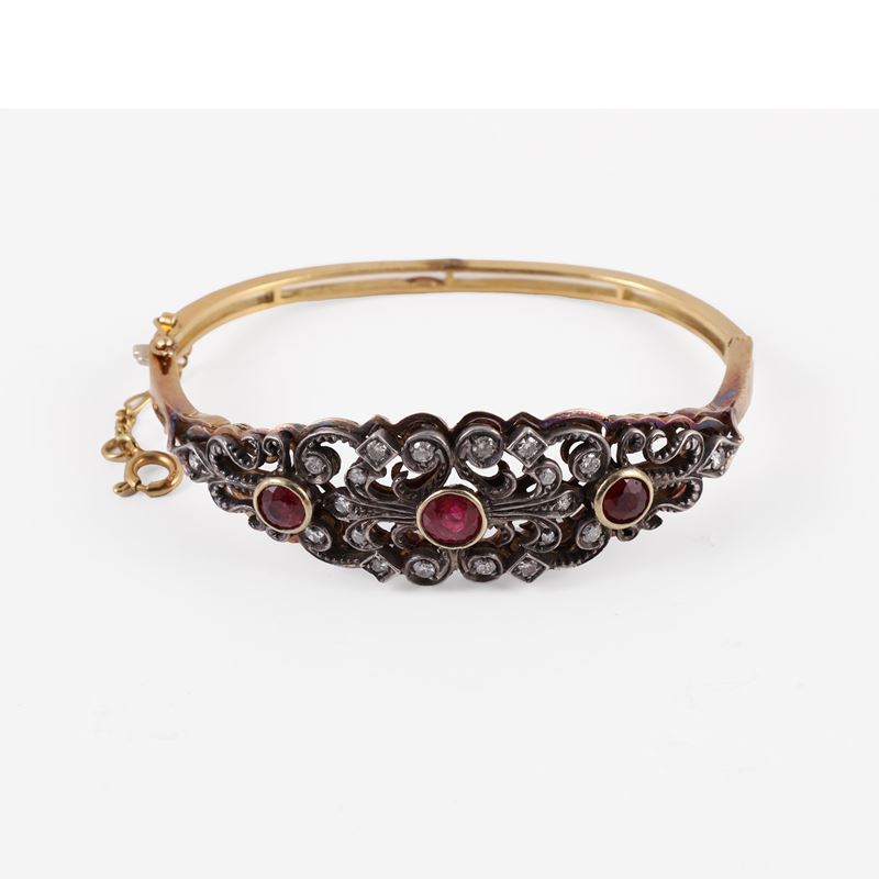 Bracciale rigido in oro e argento con rubini e brillanti