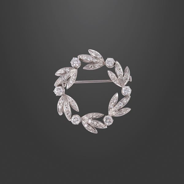 18KT GOLD AND DIAMONDS BROOCH