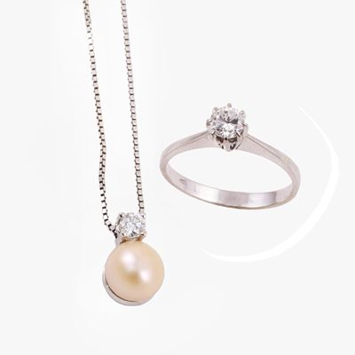 Pendente e anello in oro bianco con brillante e perla d'acqua dolce