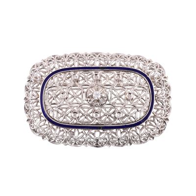 Spilla ovale in oro bianco, diamanti e smalto blu