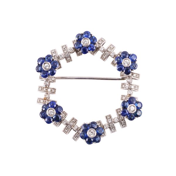 18KT GOLD BROOCH WITH DIAMONDS AND SAPPHIRES