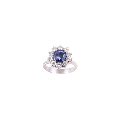 Anello in oro bianco con zaffiro e brillanti