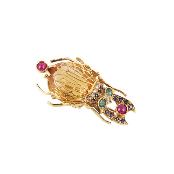 18KT GOLD BROOCH WITH QUARTZ, DIAMONDS, SAPPHIRES, EMERALDS AND RUBIES