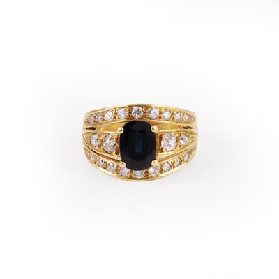 ANELLO in oro giallo con zaffiro ovale e diamanti