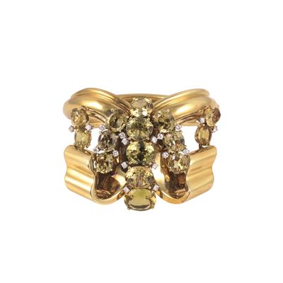 Bracciale rigido in oro giallo con crisoberilli e brillanti