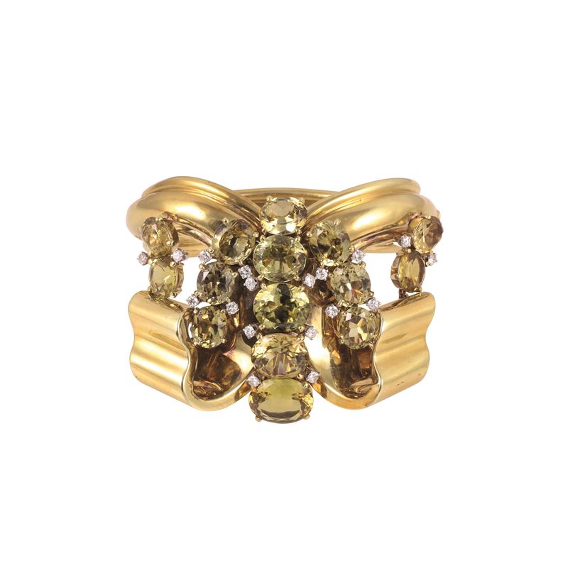 Bracciale rigido in oro giallo con crisoberilli e brillanti