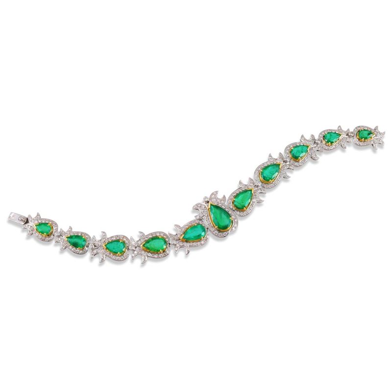 Bracciale in oro bianco e giallo 18Kt con smeraldi e brillanti