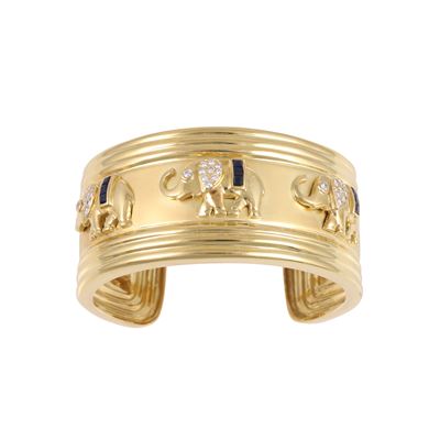 Bracciale rigido alla schiava in oro giallo con ornamenti in brillanti e zaffiri
