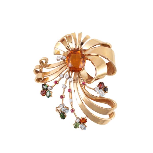 18KT GOLD BROOCH SET WITH QUARTZ, TOURMALINES, AQUAMARINES, RUBIES AND DIAMONDS