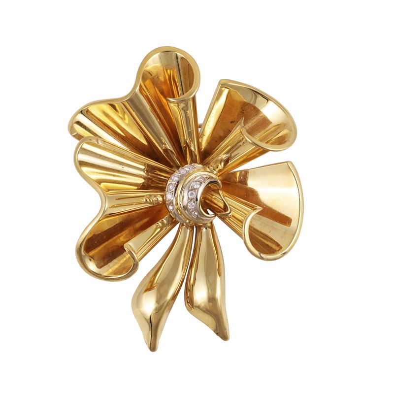 Spilla in oro giallo e bianco con brillanti