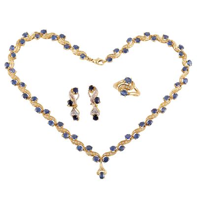 Parure in oro giallo con zaffiri e diamanti