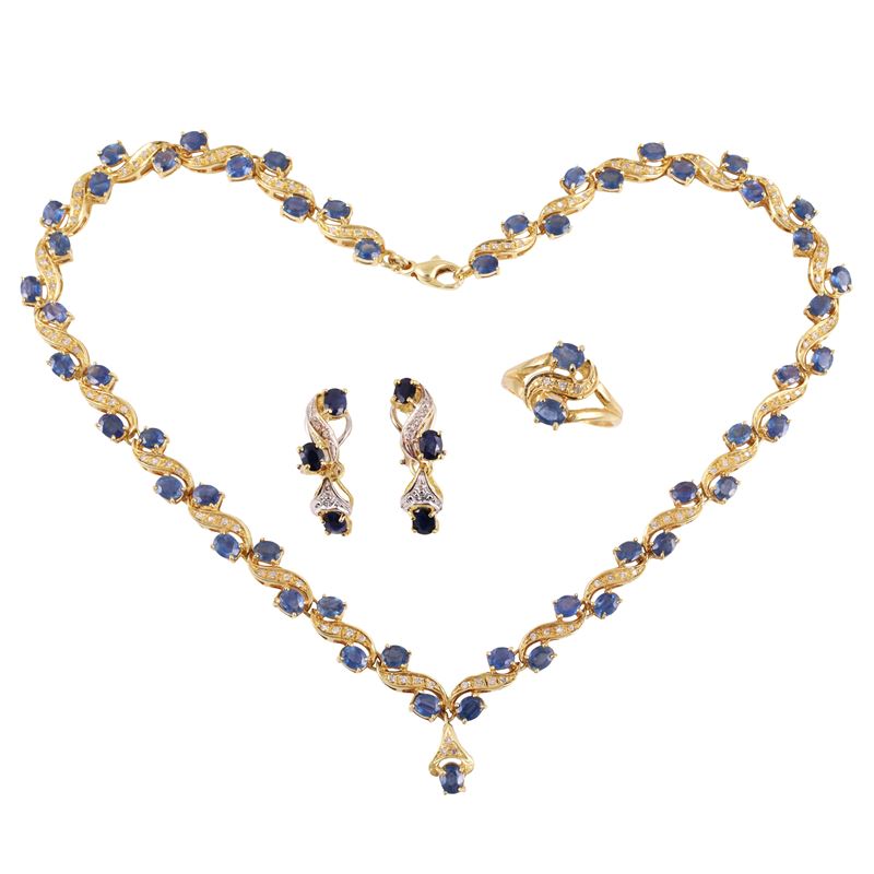 Parure in oro giallo con zaffiri e diamanti