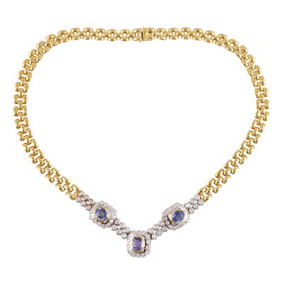 Collana in oro giallo e bianco con zaffiri e brillanti