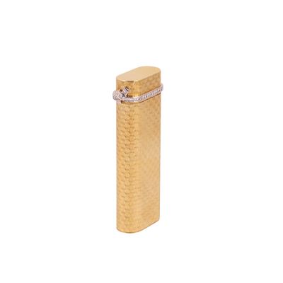 Cartier, Accendino in oro giallo con decorazioni in oro bianco e brillanti