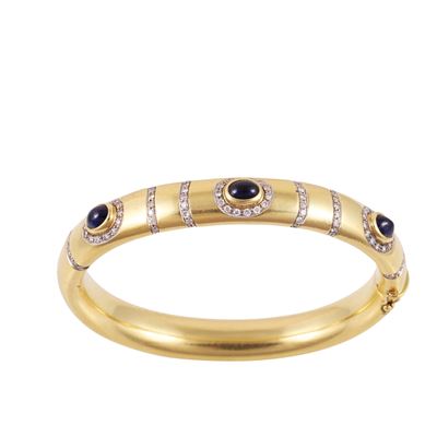 Micheletto Emilio & F., Bracciale rigido in oro giallo ornato di zaffiri e brillanti