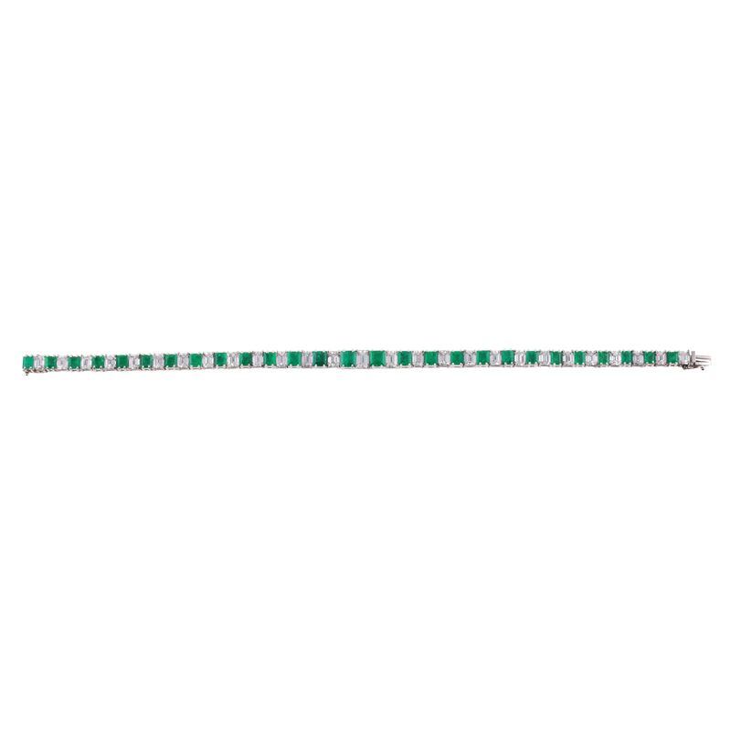 Bracciale rivière in platino con diamanti e smeraldi
