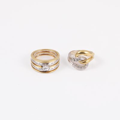 Anelli in oro giallo e bianco con diamanti, circa 0,25 ct